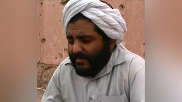 The FBI is searching for a former bin Laden associate who is suspected of collaborating with Al Qaeda; "We have not forgotten."