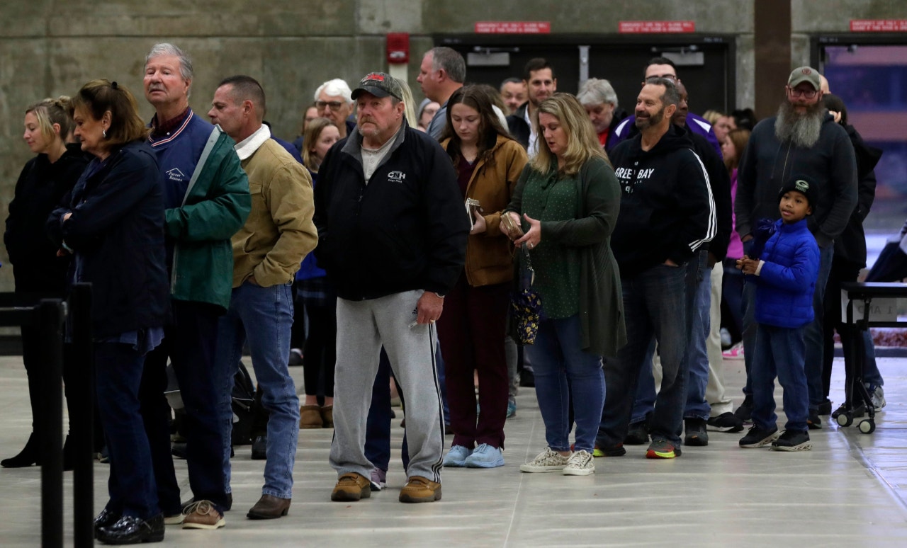 The recount of 31,000 absentee ballots in Milwaukee may delay the election results in Wisconsin.