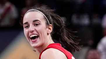 Caitlin Clark sets new WNBA single-season assist record.