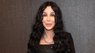 After giving an ultimatum, Cher confesses to having a "really good director" fired.