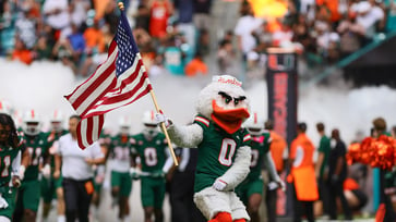 Miami mascot accused of flirting during Syracuse upset by college football reporter.