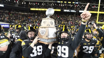 Nebraska players decline pregame handshake, prompting Iowa to troll them.