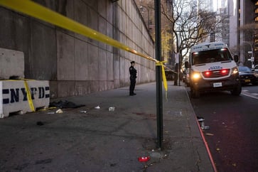 Two men are dead and a woman is critically injured after a stabbing spree in New York City, with the suspect in custody, according to police.