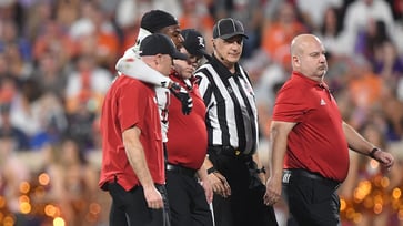 A Louisville football player was stretchered off the field and hospitalized after sustaining an injury during a game.