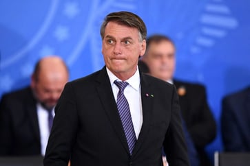 Aides and former Brazilian President Bolsonaro face charges of attempting a coup in 2022.