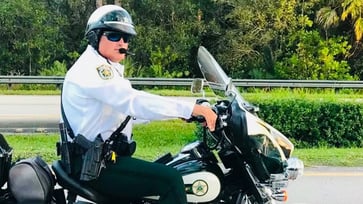 Florida deputy battles for survival after deadly crash claims the lives of two colleagues.