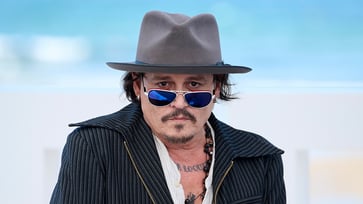 Johnny Depp alerts his followers to be cautious of fraudulent online scammers attempting to swindle his fans out of money.