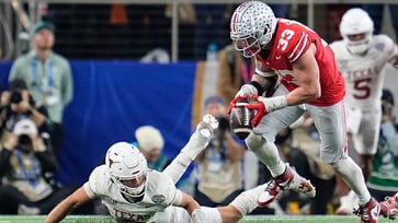 Jack Sawyer, an Ohio State hero, shares the 2-word message Quinn Ewers gave him after a touchdown.