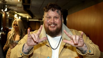 Jelly Roll, a country singer, confesses that he has second thoughts about some of his facial ink.