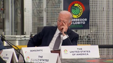 Biden seems to close his eyes during the African summit in Angola.