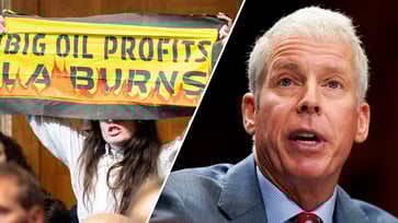 Climate protesters heckle Trump energy nominee, while Dem senator labels him an "enthusiast for fossil fuels."