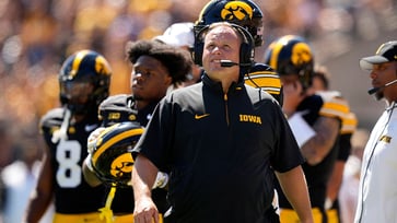 While Coach Kirk Ferentz is serving a suspension, Iowa dominates Illinois State with a blowout victory.