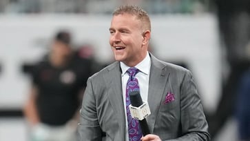 During a broadcast, Kirk Herbstreit, an Ohio State football alumnus, becomes emotional after the Buckeyes win the national title.