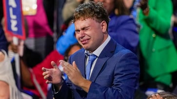 During his DNC speech, Gus Walz was moved to tears as he shared an emotional moment with his father Tim, saying, "That's my Dad."