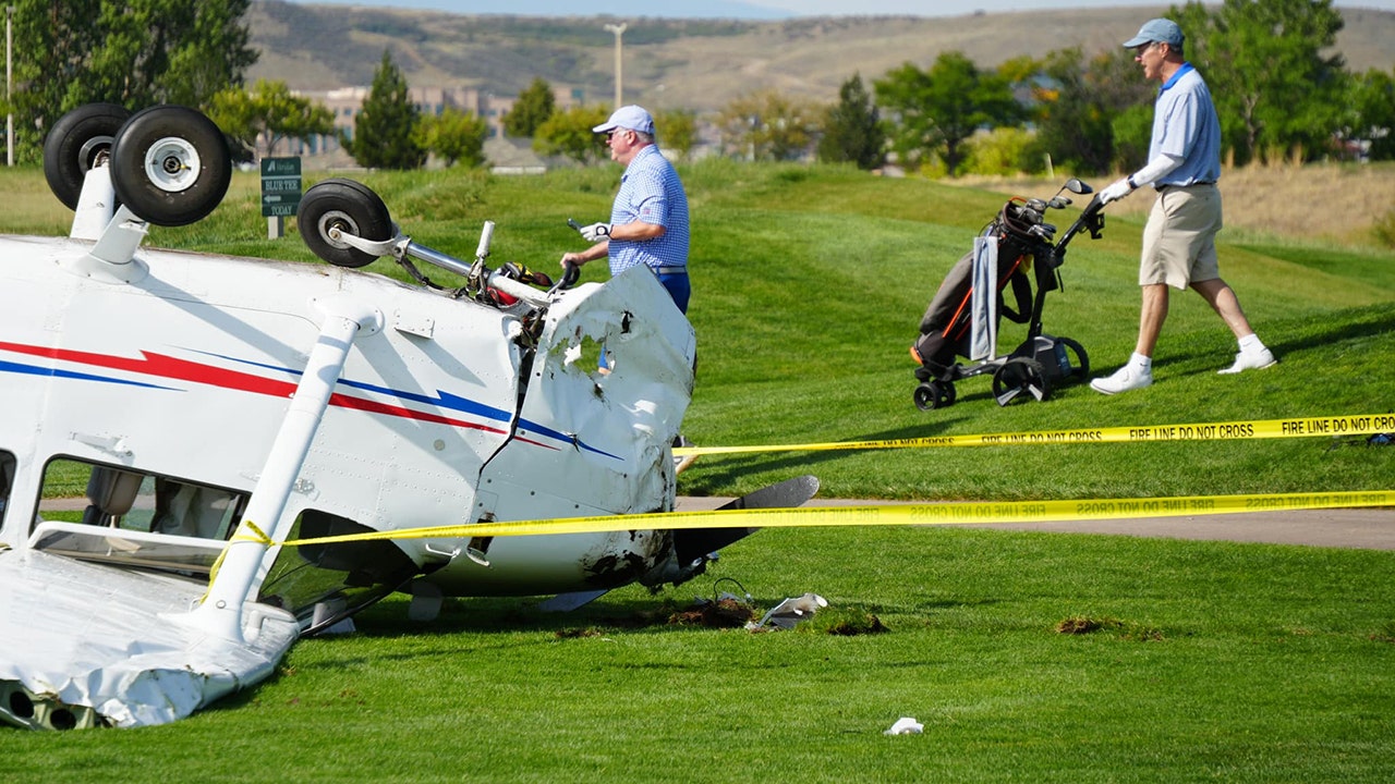 Stunning images depict Colorado plane crash on golf course