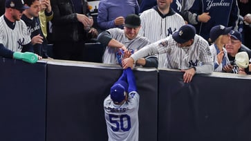 MLB indefinitely bans Yankees fans who interfered with Mookie Betts during the World Series, according to a report.