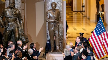 Rev. Graham's tribute at the Capitol is statuesque, but he avoids the spotlight.