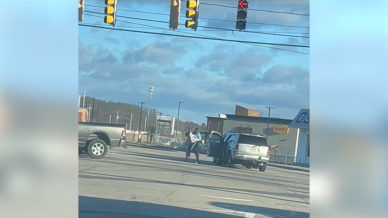 A road rage suspect violently assaults his mother by dragging her out of the car and slamming her onto the pavement.