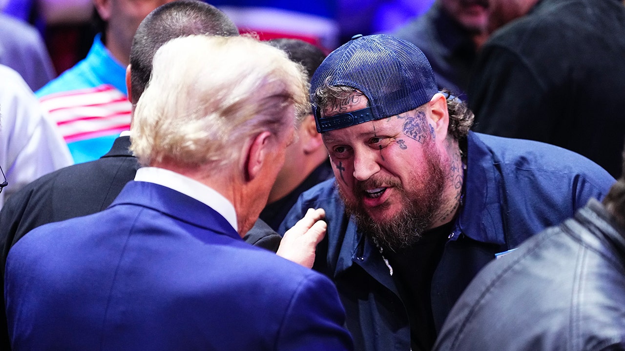 Jelly Roll defends his encounter with Donald Trump at UFC event, emphasizing the significance of respecting the president.