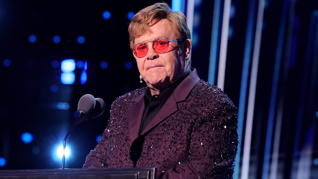 Elton John is experiencing "reduced vision" after a health scare.