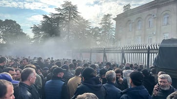 In Georgia's breakaway region, protesters storm Putin-backed parliament.