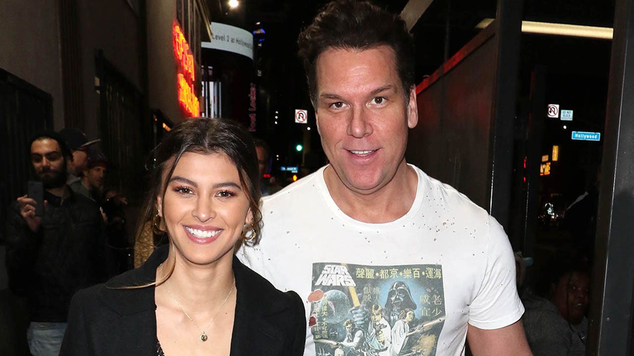 Dane Cook, 52, is "blissfully in love" with his 25-year-old wife and desires to "celebrate every triumph together."