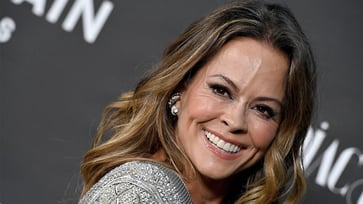 Brooke Burke finds joy in Arizona's rural lifestyle, including rodeos, country music, and stunning sunsets.