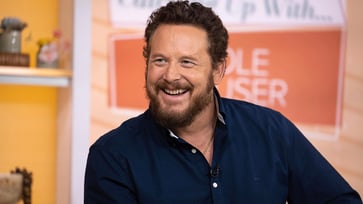 A trip to Walter Reed Army Medical Center transformed the life of 'Yellowstone' actor Cole Hauser.