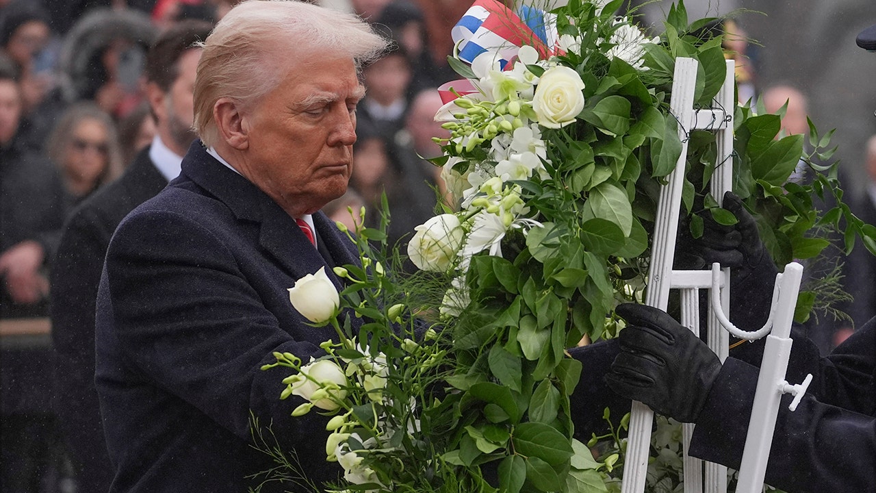 Before his inauguration, Trump pays tribute at the Tomb of the Unknown Soldier.