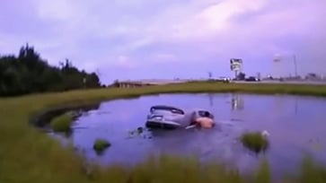 'Incredible' to witness the mother's 'life restored' after being rescued from a submerged car by police and Good Samaritans.