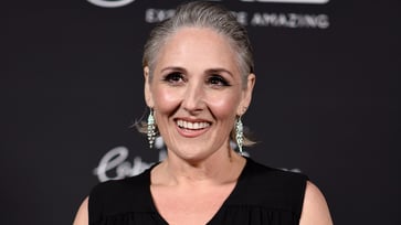 Ricki Lake claims that the celebrity psychic had predicted the destruction of her home in California months ago.