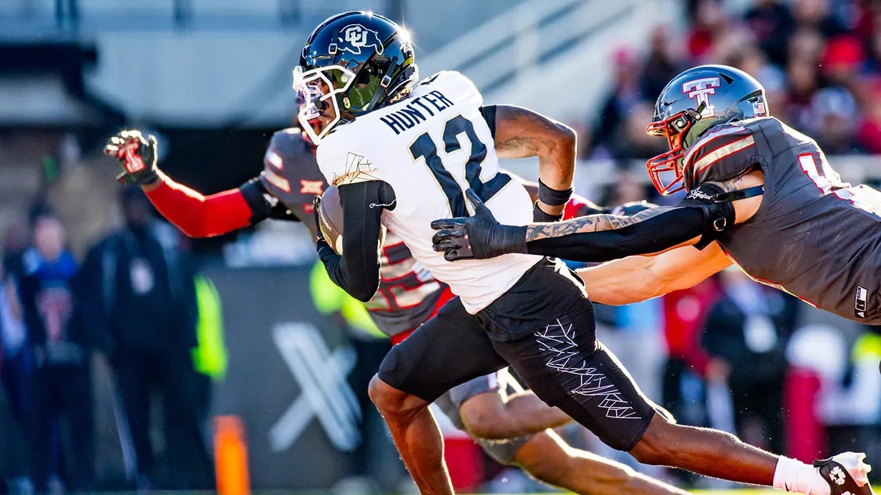 No. 20 Colorado remains in the College Football Playoff race with Heisman contender Travis Hunter's impressive play.