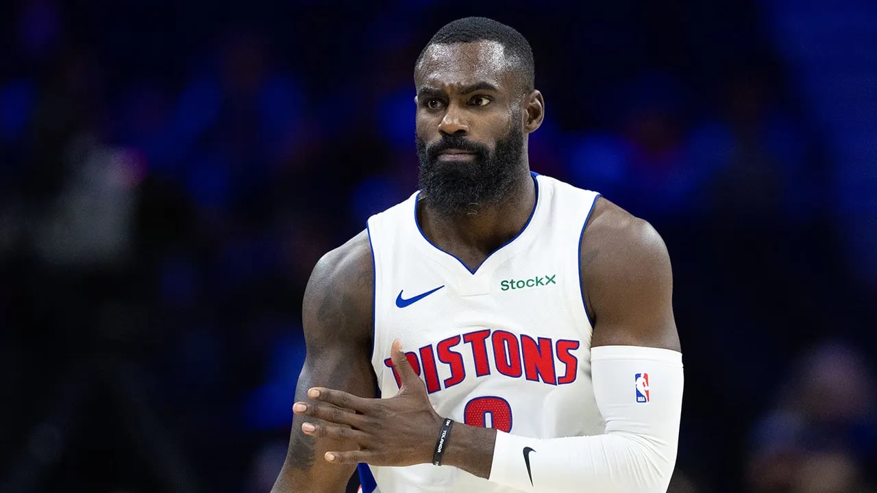 Tim Hardaway Jr of the Pistons exits the game in a wheelchair after a terrifying incident where he collided headfirst with the court.