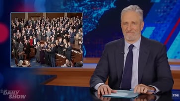 Jon Stewart grimaces as Harris is forced to certify Trump's election victory.