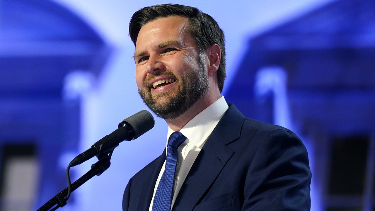 North Carolina college football fans cheered for JD Vance and his wife Usha.