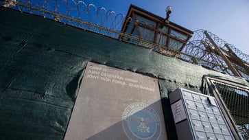 The Biden administration has transferred 11 Guantanamo detainees to Oman for resettlement.