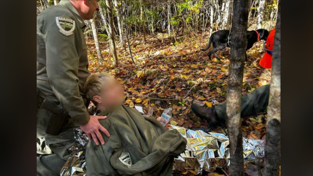 Rescued woman found hundreds of feet from missing husband in Maine forest.