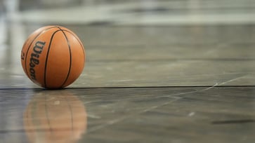 The women's basketball team has canceled a game, accusing a transgender player of abuse, while the Christian opponent denies the allegations.