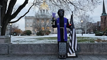 To avoid litigation, the New Hampshire capital has included a Satanic symbol in their holiday display.