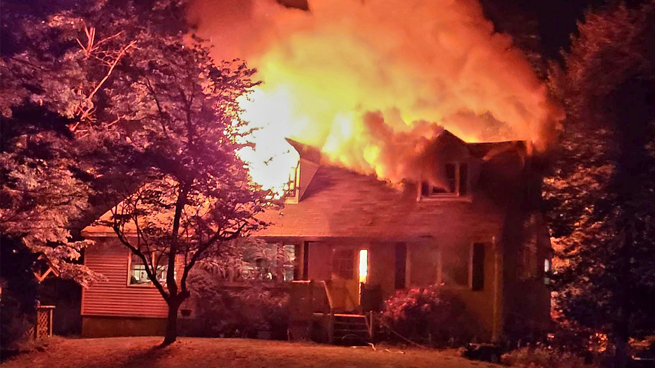 A New Jersey man is accused of setting the home of his girlfriend's parents on fire while she was still inside following an argument.