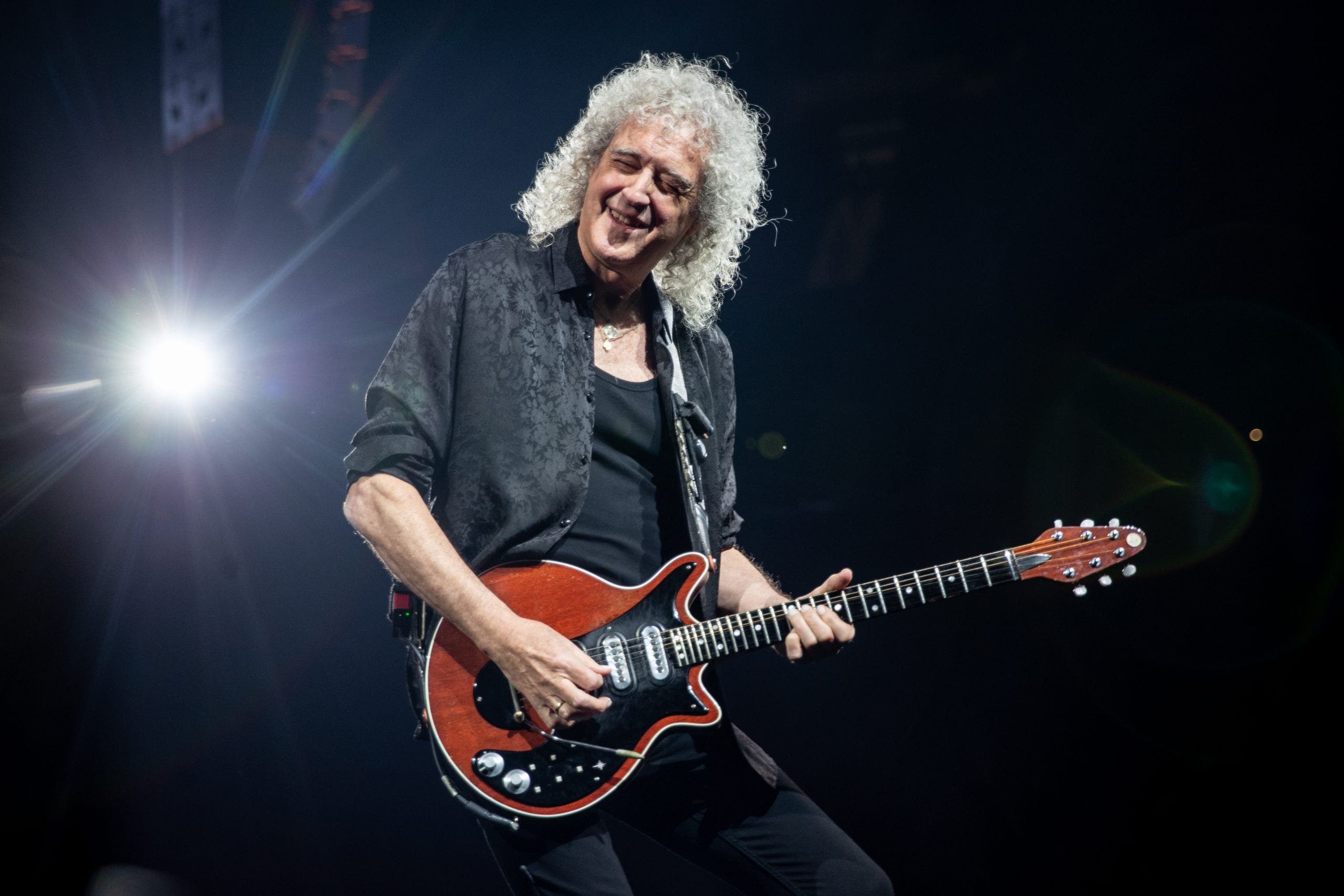 Brian May, the guitarist of the Queen band, experienced a 'scary' minor stroke that caused him to lose control of his arm.