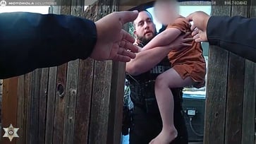 Video footage of Colorado deputies' brave rescue of two children from a house fire has been captured on body camera.