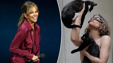 Halle Berry celebrates 20th anniversary of 'Catwoman' by posing topless with her cats.