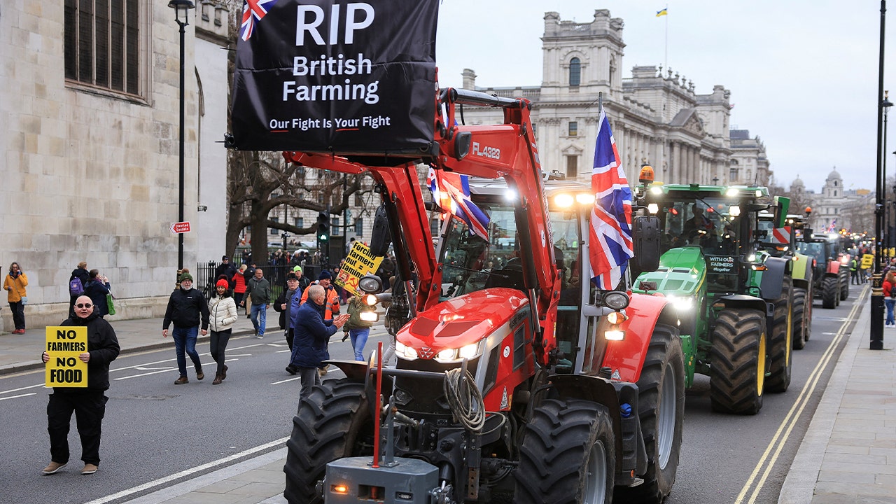 Farmers in central London protest against changes in tax laws.