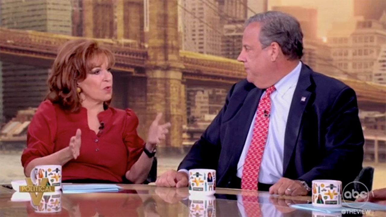 Chris Christie is criticized by Joy Behar for not explicitly stating his support for Kamala Harris.