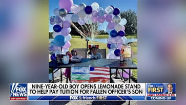 A Florida boy sets up a lemonade stand to pay for his fallen officer father's daycare expenses: "What Jesus would do"