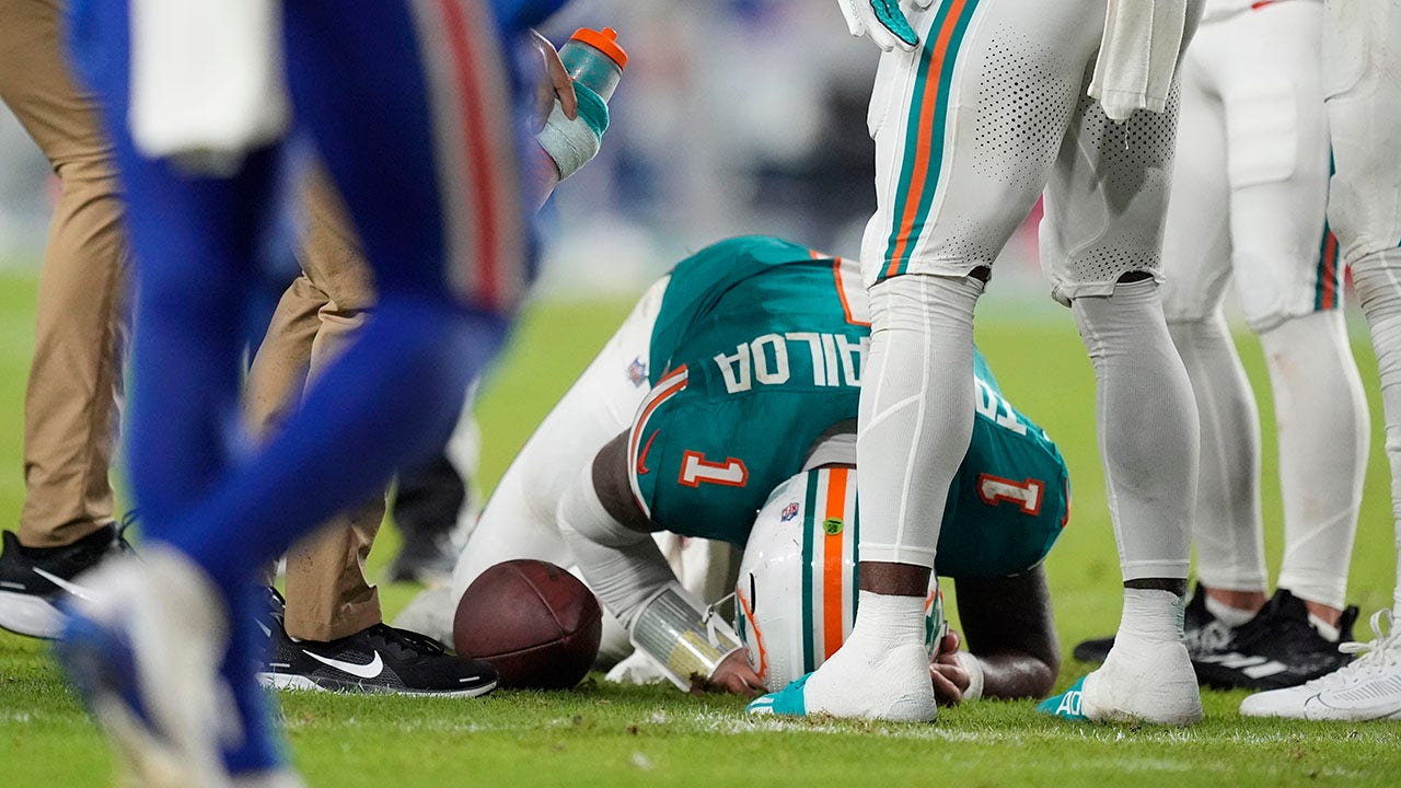 Damar Hamlin of the Bills suffers a concussion after a collision with Tua Tagovailoa of the Dolphins.