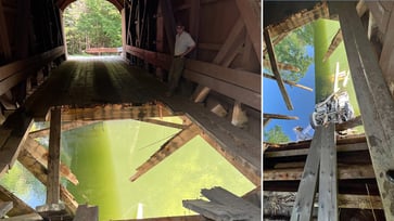 A truck fell through the historic covered bridge, leaving a huge hole.