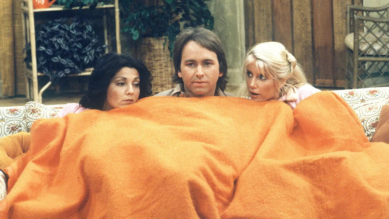 The star of "Three's Company" believes the show has "lifelong fans" because it offered a "safe haven" from "oppressive" times.